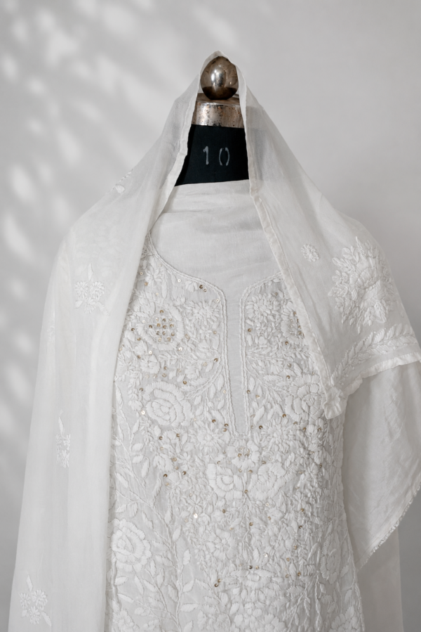 Pure White Tone-on-Tone Handwork Threadwork Suit for Women with Elegant Embroidered Ethnic Design
